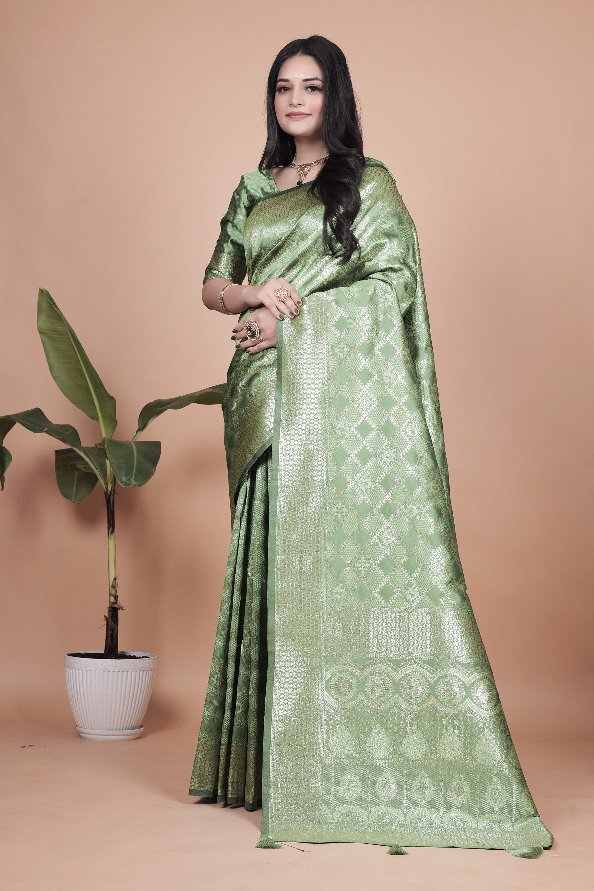 Green Banarasi Silk Saree with Traditional Zari Work and Tassel Detailing – Perfect for Weddings, Festive Occasions, and Parties