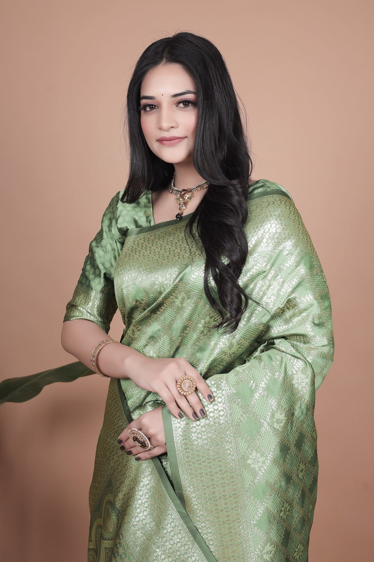 Green Banarasi Silk Saree with Traditional Zari Work and Tassel Detailing – Perfect for Weddings, Festive Occasions, and Parties