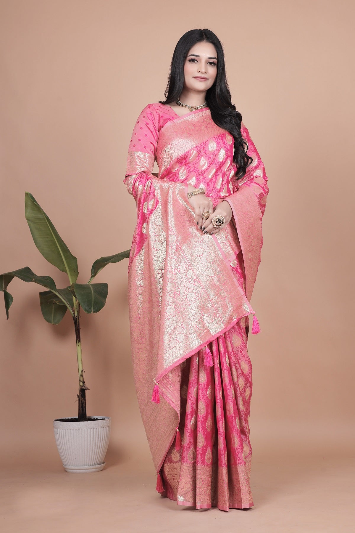 Elegant Pink Banarasi Silk Saree with Golden Zari Work & Tassel Border