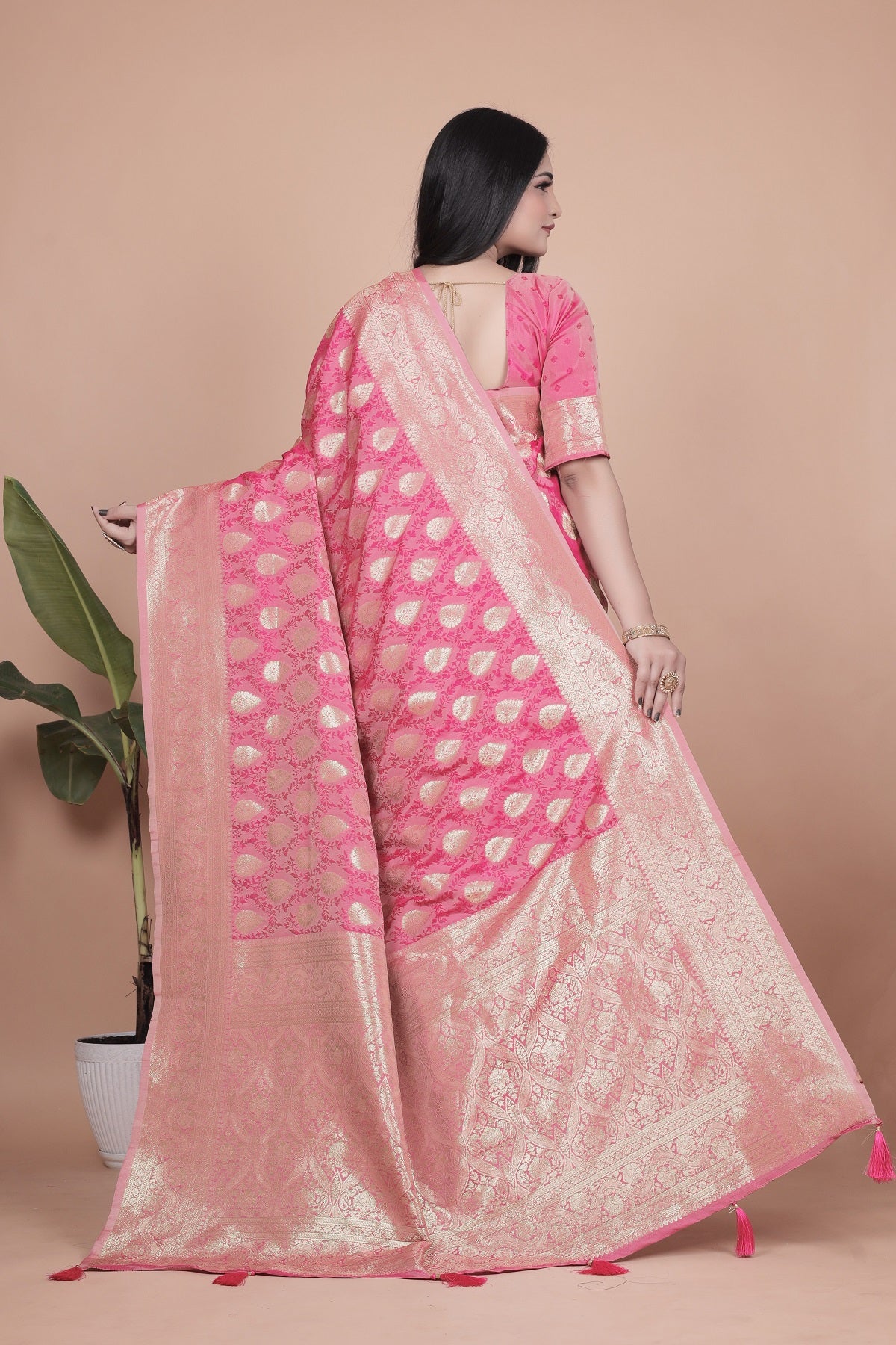 Elegant Pink Banarasi Silk Saree with Golden Zari Work & Tassel Border