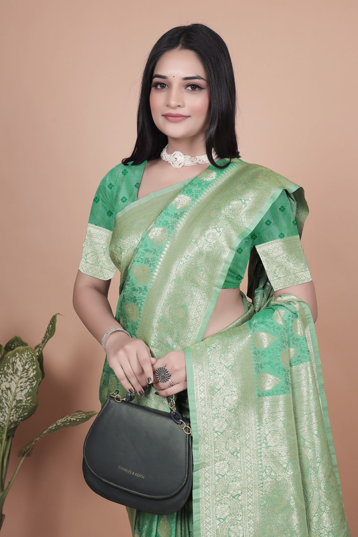 Elegant Green Banarasi Silk Saree with Golden Zari Work & Tassel Border