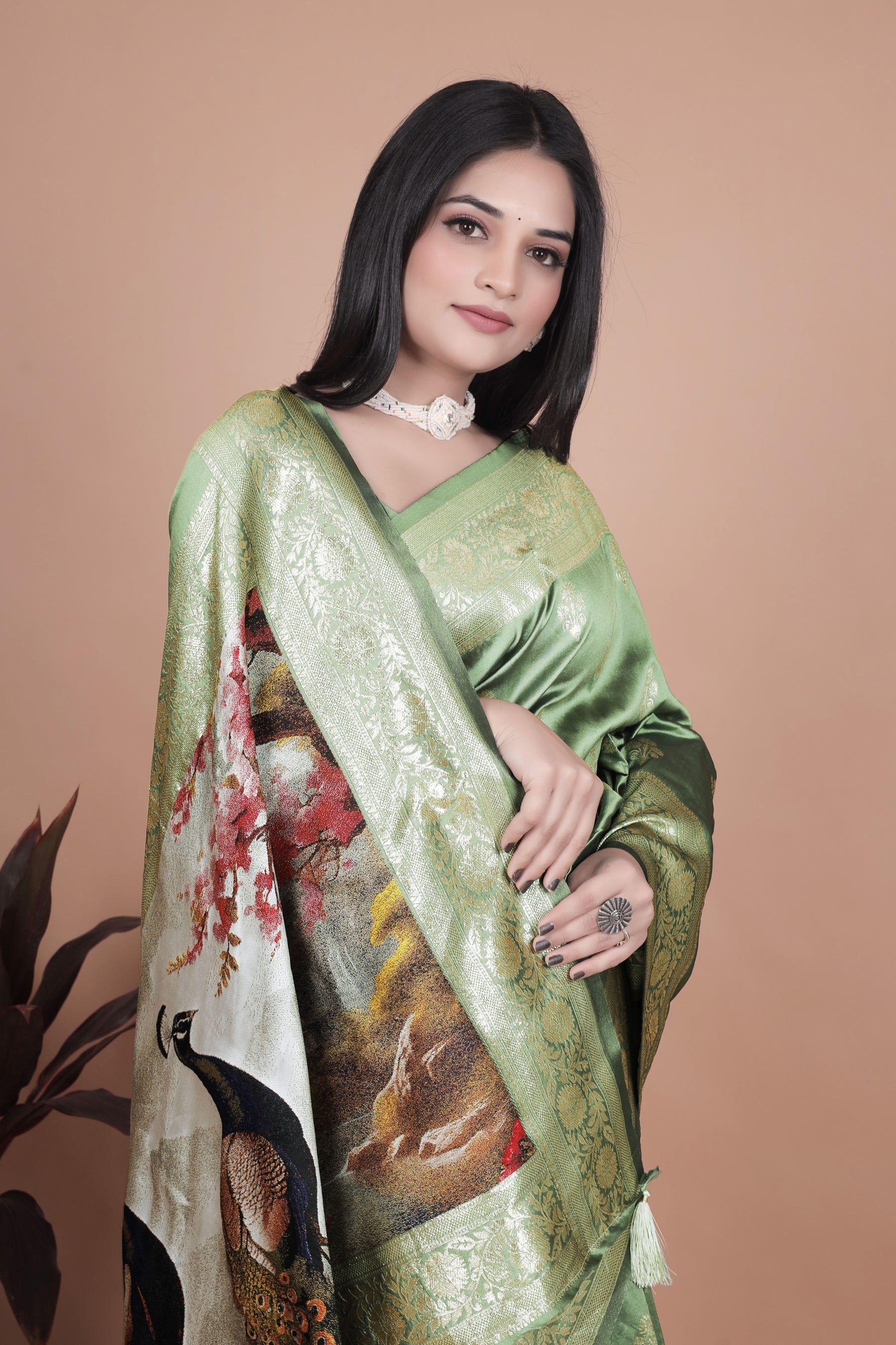 Elegant Green Silk Saree with Peacock Design and Golden Border