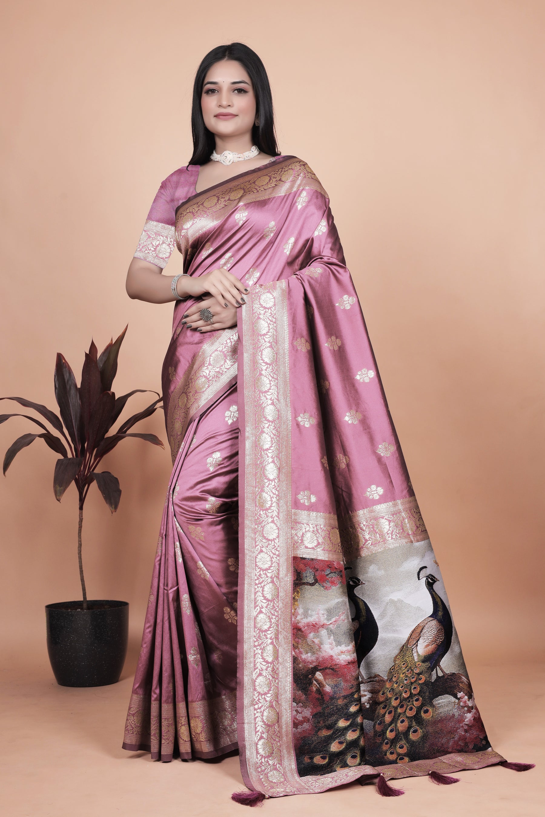 Graceful Lilac Saree with Intricate Golden Border and Peacock Art