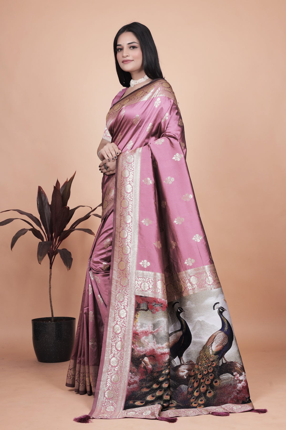 Graceful Lilac Saree with Intricate Golden Border and Peacock Art