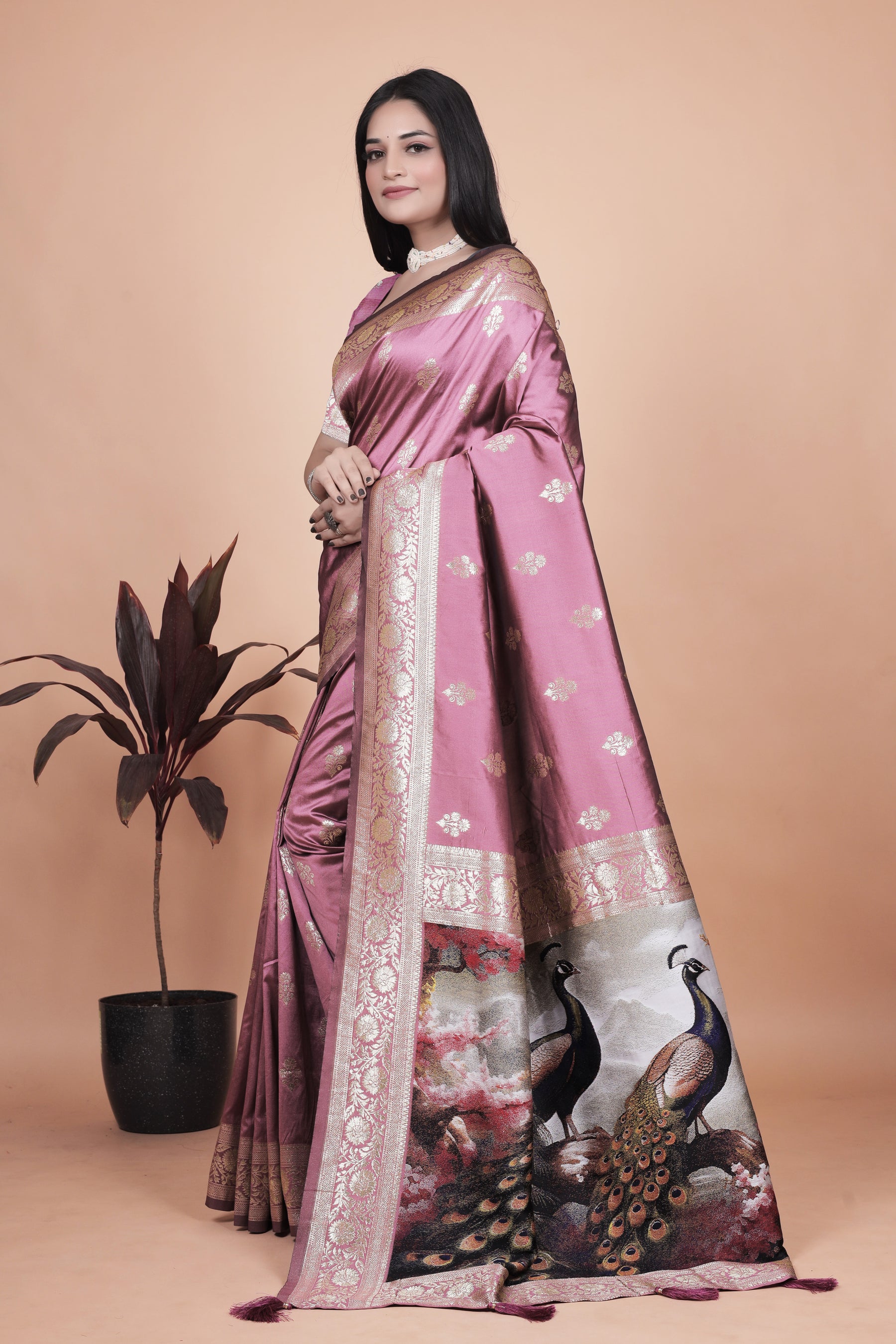 Graceful Lilac Saree with Intricate Golden Border and Peacock Art