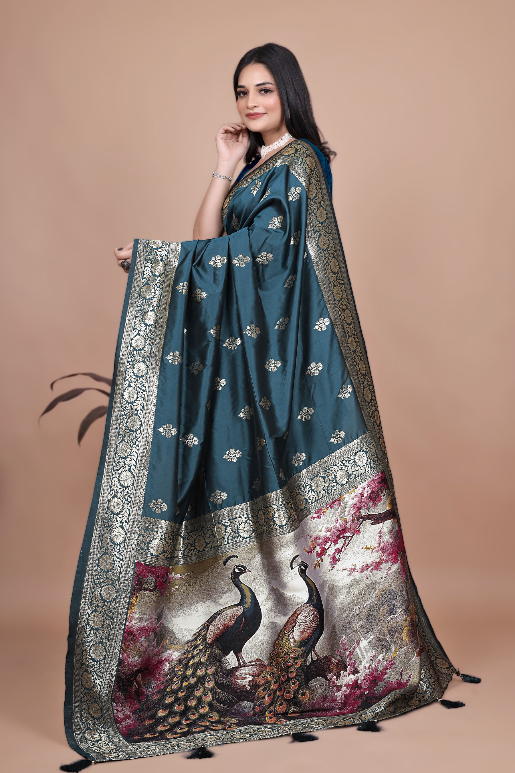 Graceful Teal Saree with Peacock Border and Silver Zari for Weddings & Festivals