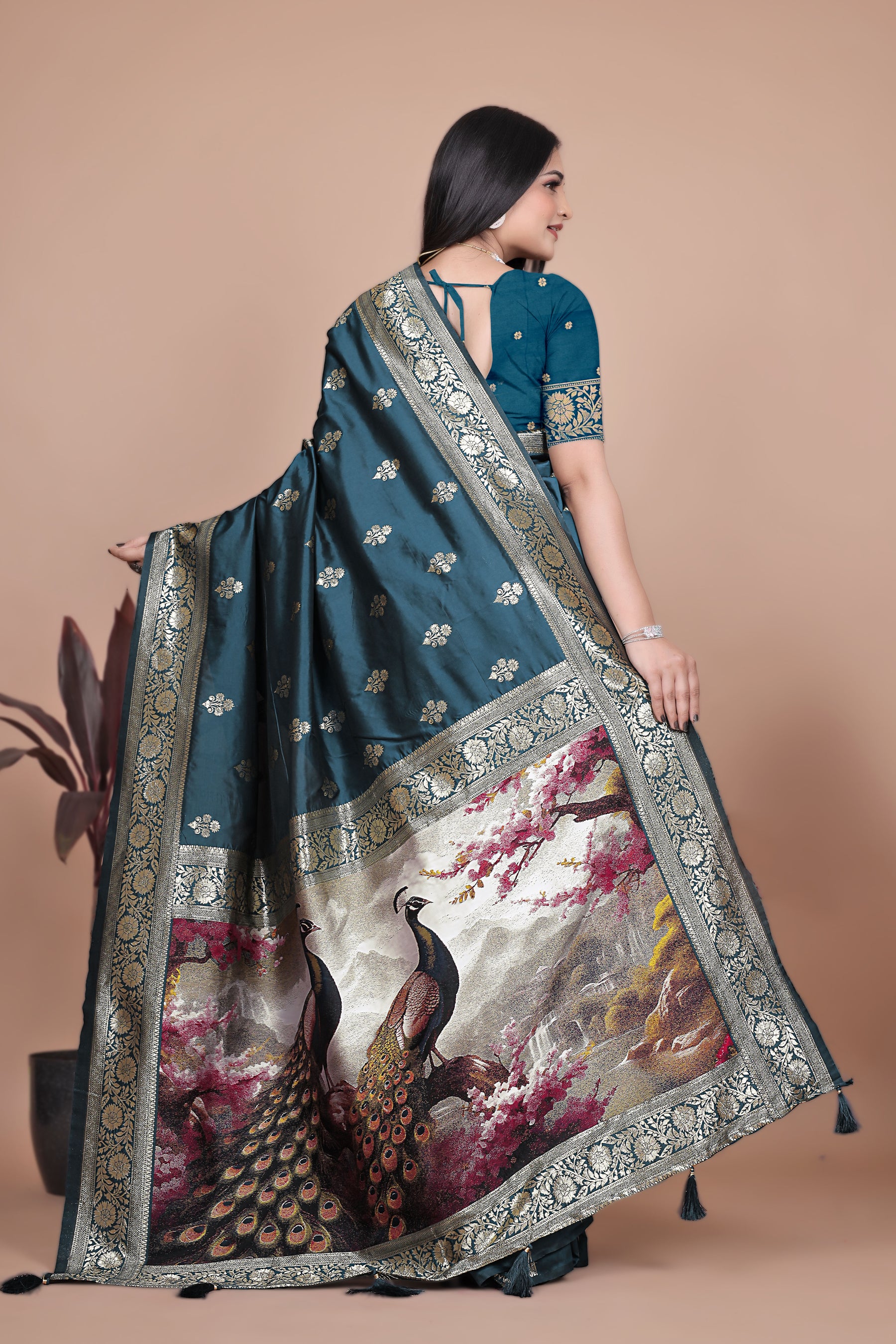 Graceful Teal Saree with Peacock Border and Silver Zari for Weddings & Festivals