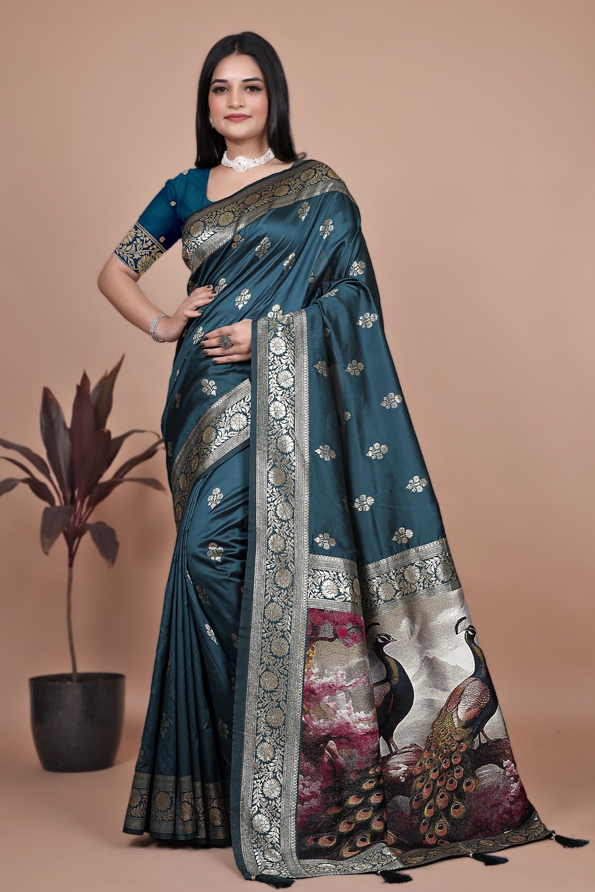 Graceful Teal Saree with Peacock Border and Silver Zari for Weddings & Festivals