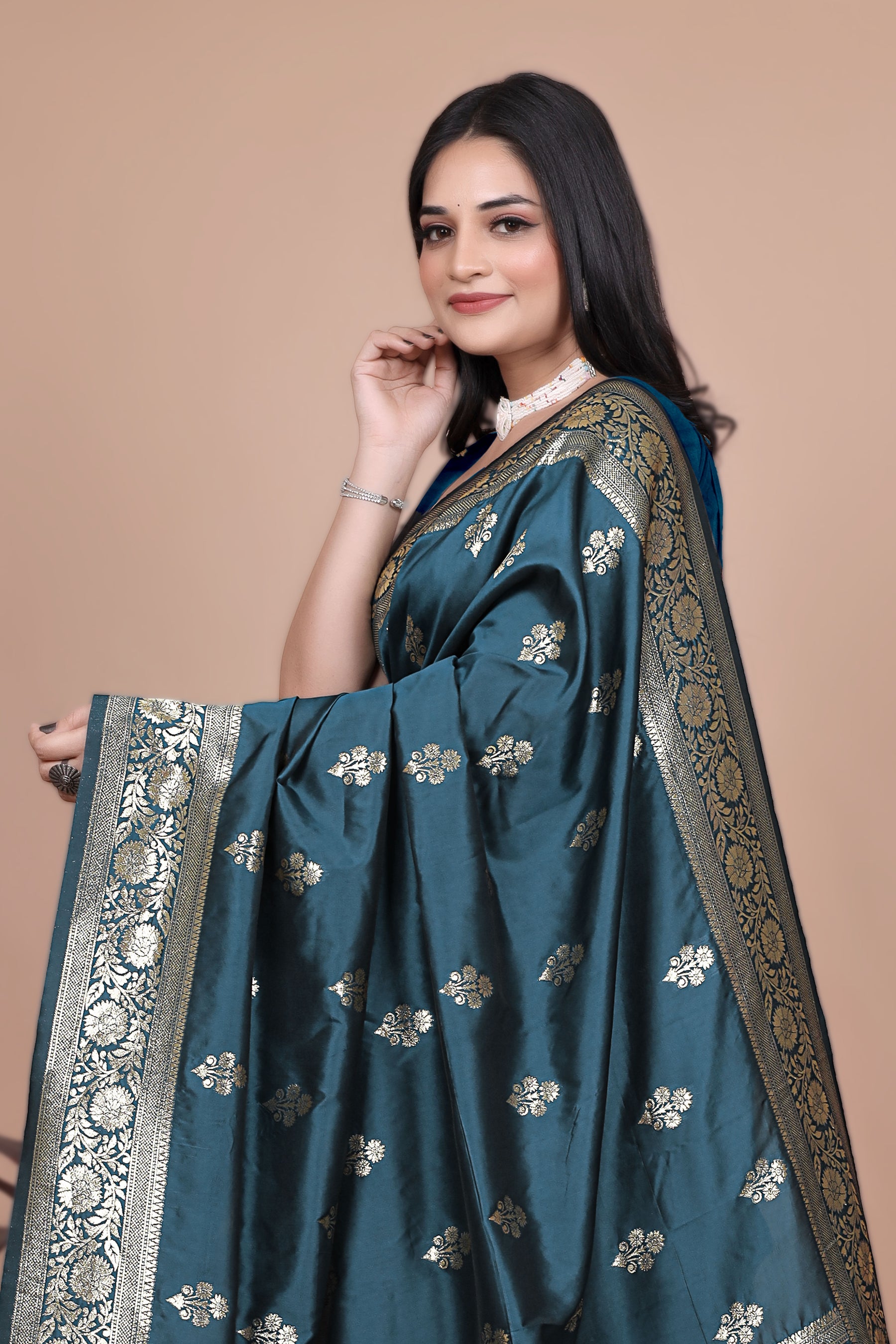Graceful Teal Saree with Peacock Border and Silver Zari for Weddings & Festivals