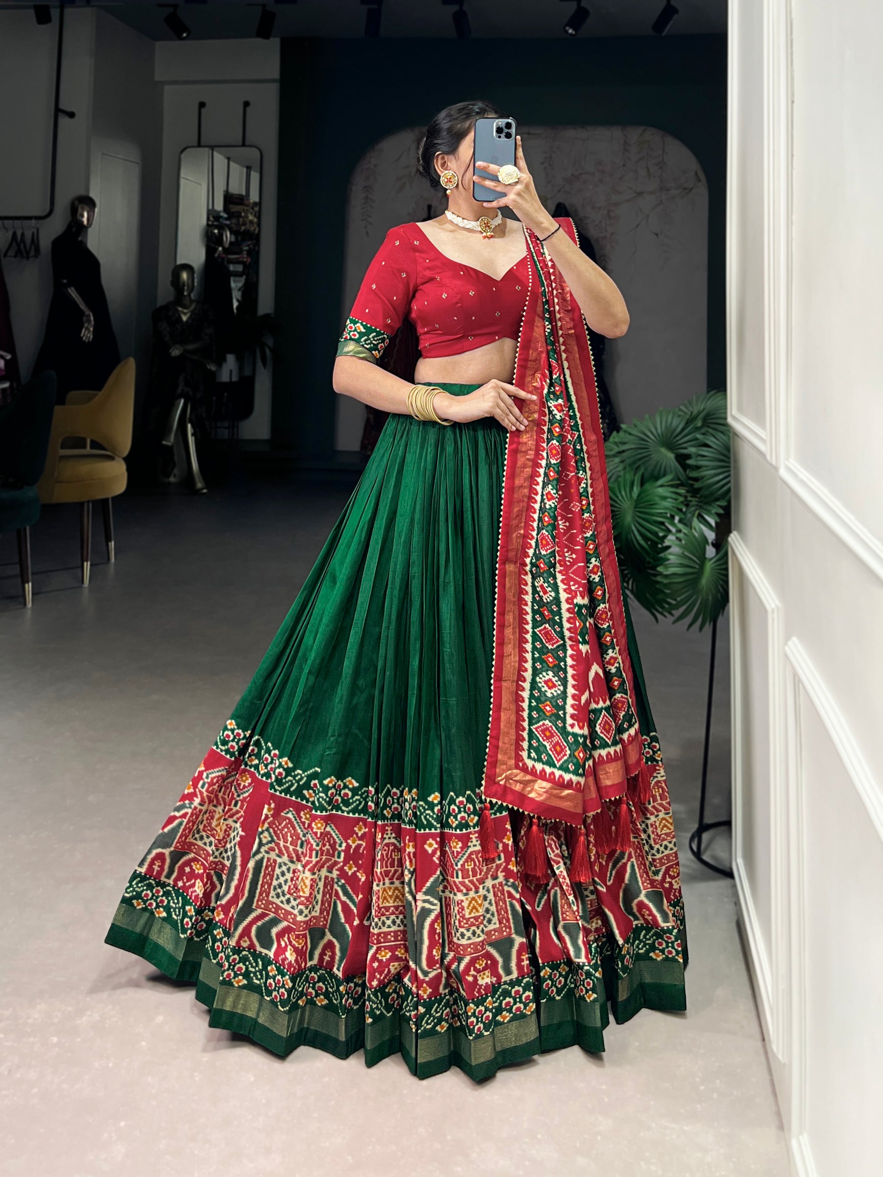 Ethnic Green & Red Lehenga Choli with Tassels & Patola Print