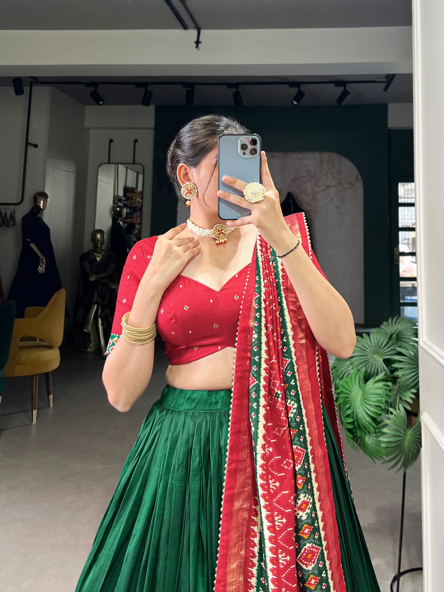 Ethnic Green & Red Lehenga Choli with Tassels & Patola Print