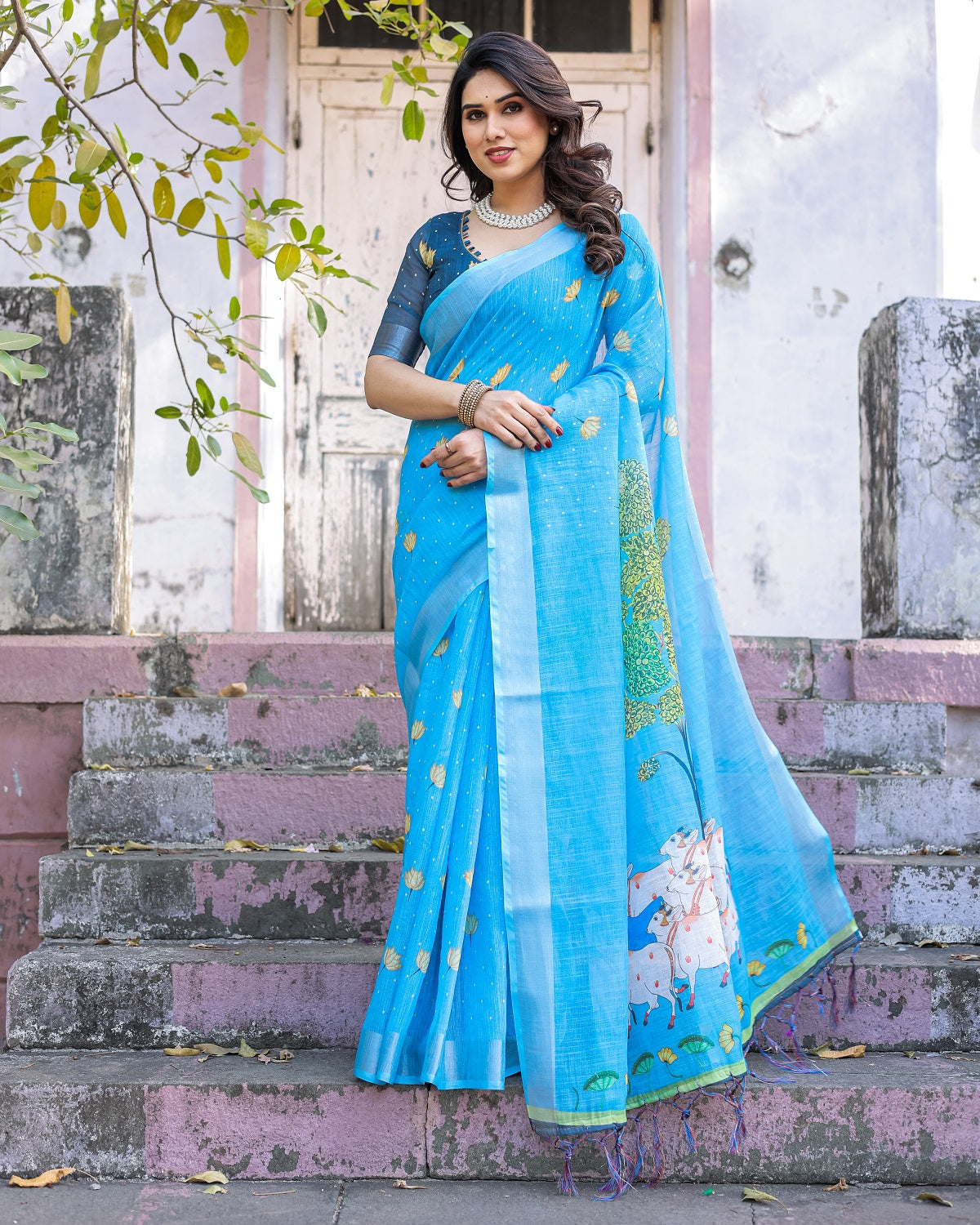 Elegant Sky Blue Linen Saree with White Lotus Print & Silver Zari Border