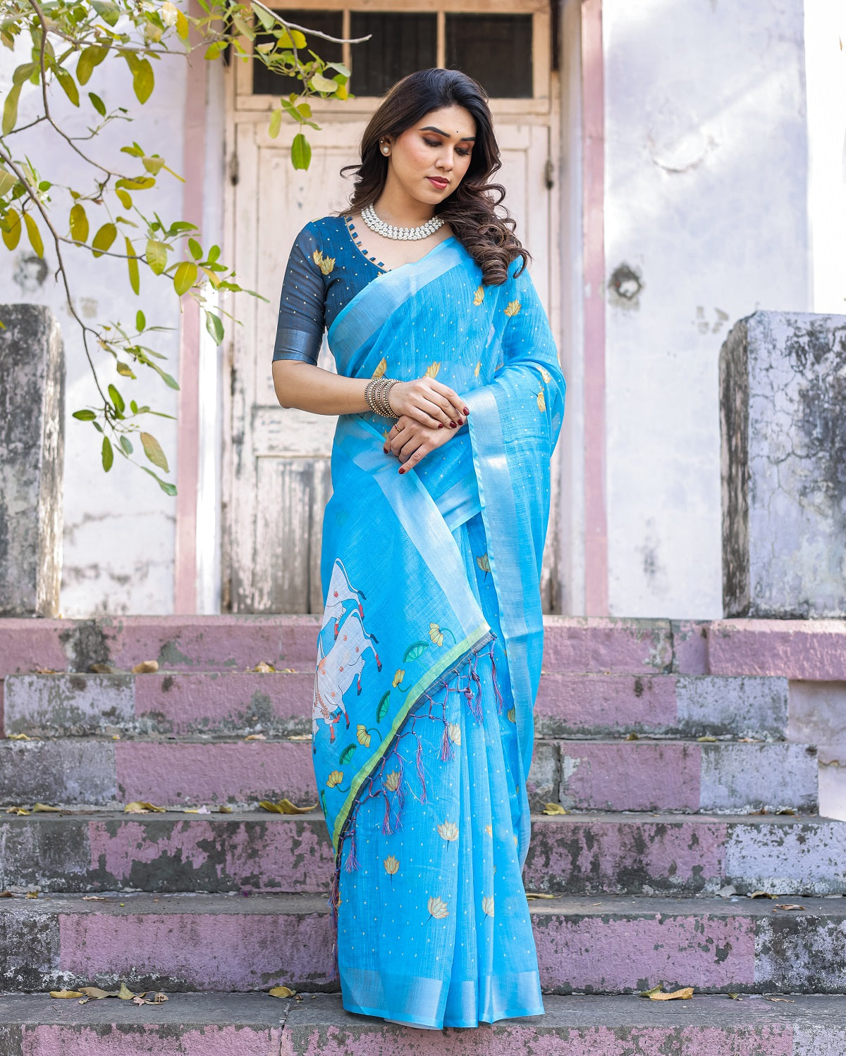 Elegant Sky Blue Linen Saree with White Lotus Print & Silver Zari Border