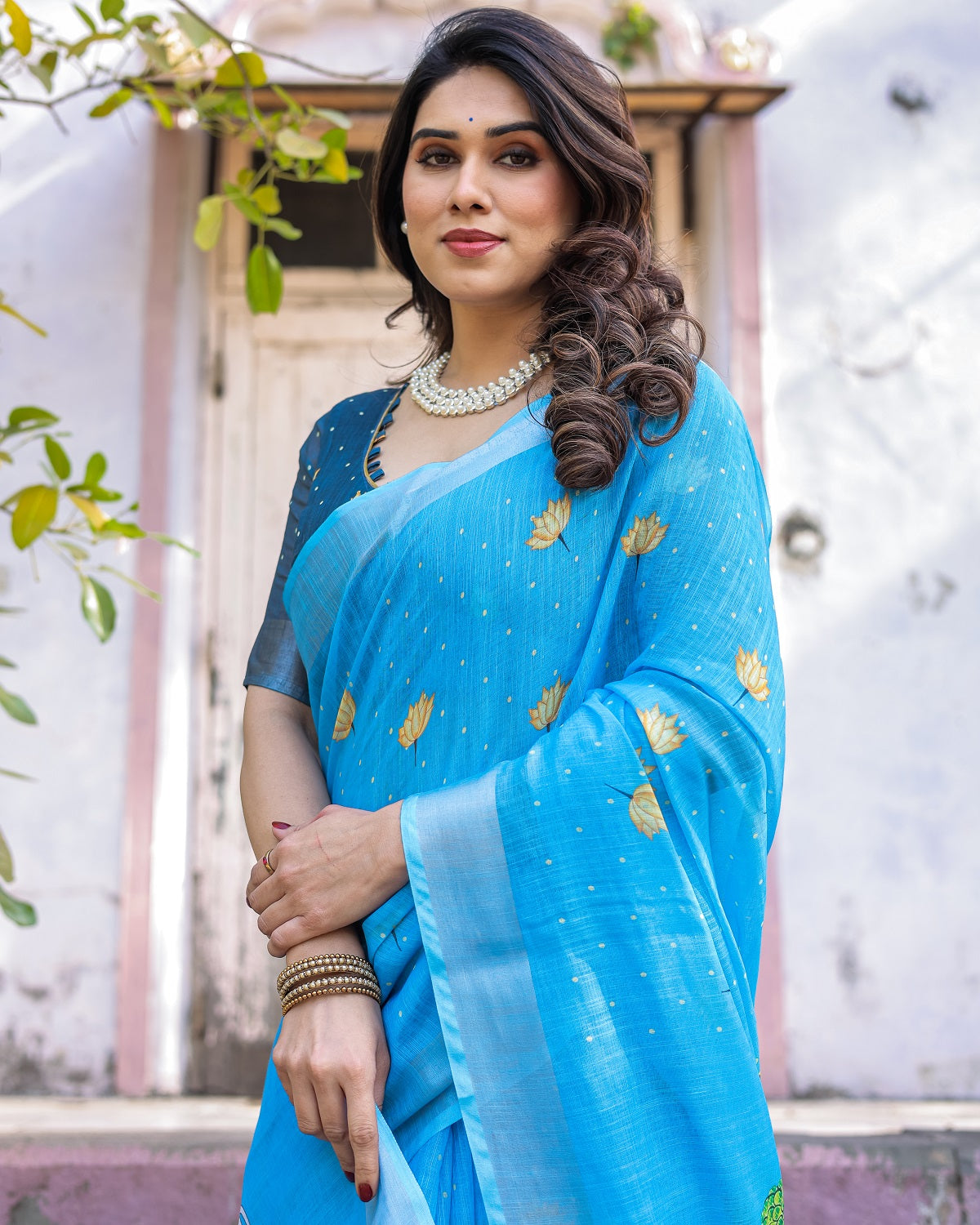 Elegant Sky Blue Linen Saree with White Lotus Print & Silver Zari Border