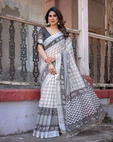 Elegant White Linen Saree with White Lotus Print & Silver Zari Border
