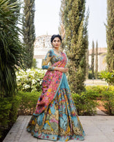 Hand-Painted Radha Krishna Lehenga Set – Teal & Pink Ethnic Outfit with Mythological Art & Floral Dupatta