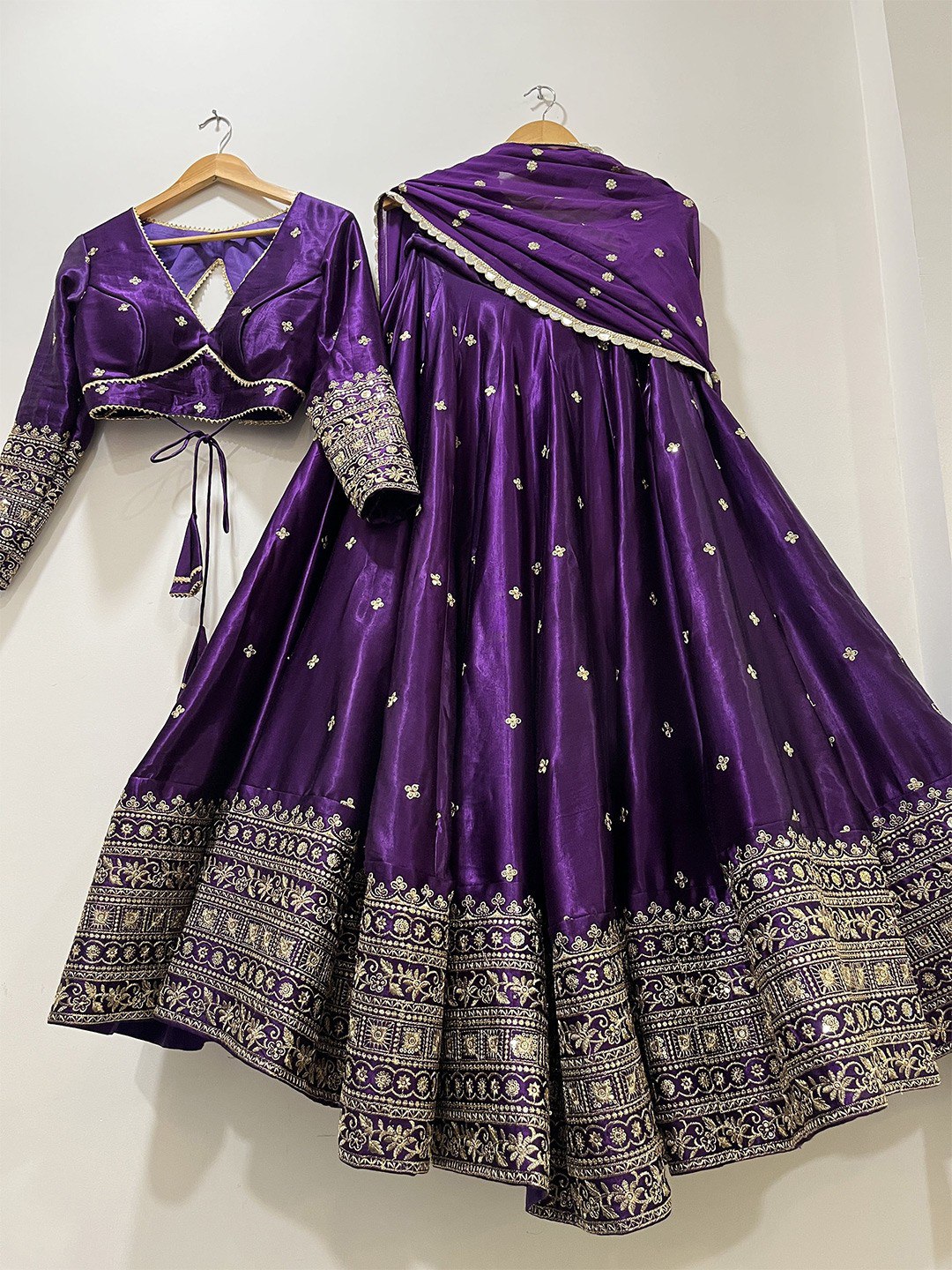 Royal Purple Silk Lehenga Choli with Heavy Gold Embroidered Border & Dupatta