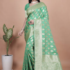 Elegant Green Banarasi Silk Saree with Golden Zari Work & Tassel Border