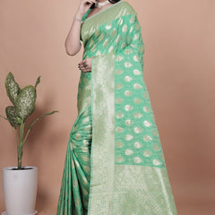 Elegant Green Banarasi Silk Saree with Golden Zari Work & Tassel Border