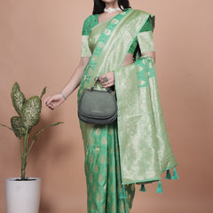 Elegant Green Banarasi Silk Saree with Golden Zari Work & Tassel Border
