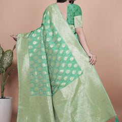 Elegant Green Banarasi Silk Saree with Golden Zari Work & Tassel Border