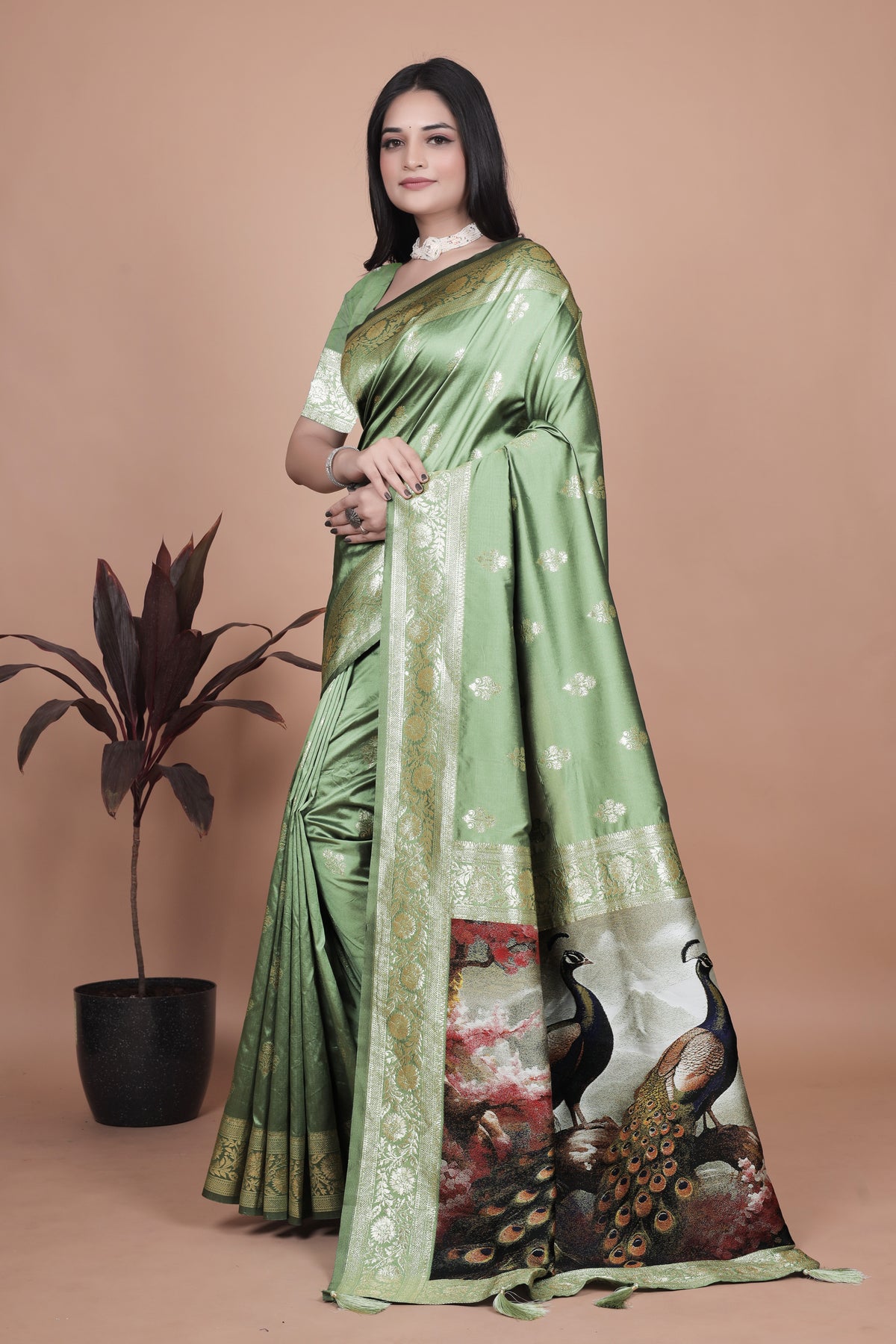 Elegant Green Silk Saree with Peacock Design and Golden Border