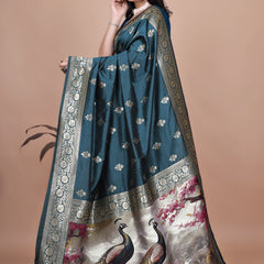 Graceful Teal Saree with Peacock Border and Silver Zari for Weddings & Festivals