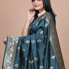 Graceful Teal Saree with Peacock Border and Silver Zari for Weddings & Festivals