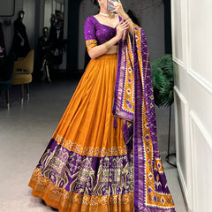 Ethnic Yellow & Purple Lehenga Choli with Tassels & Patola Print