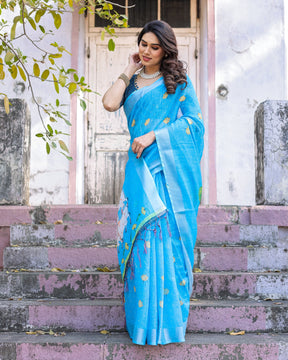 Elegant Sky Blue Linen Saree with White Lotus Print & Silver Zari Border
