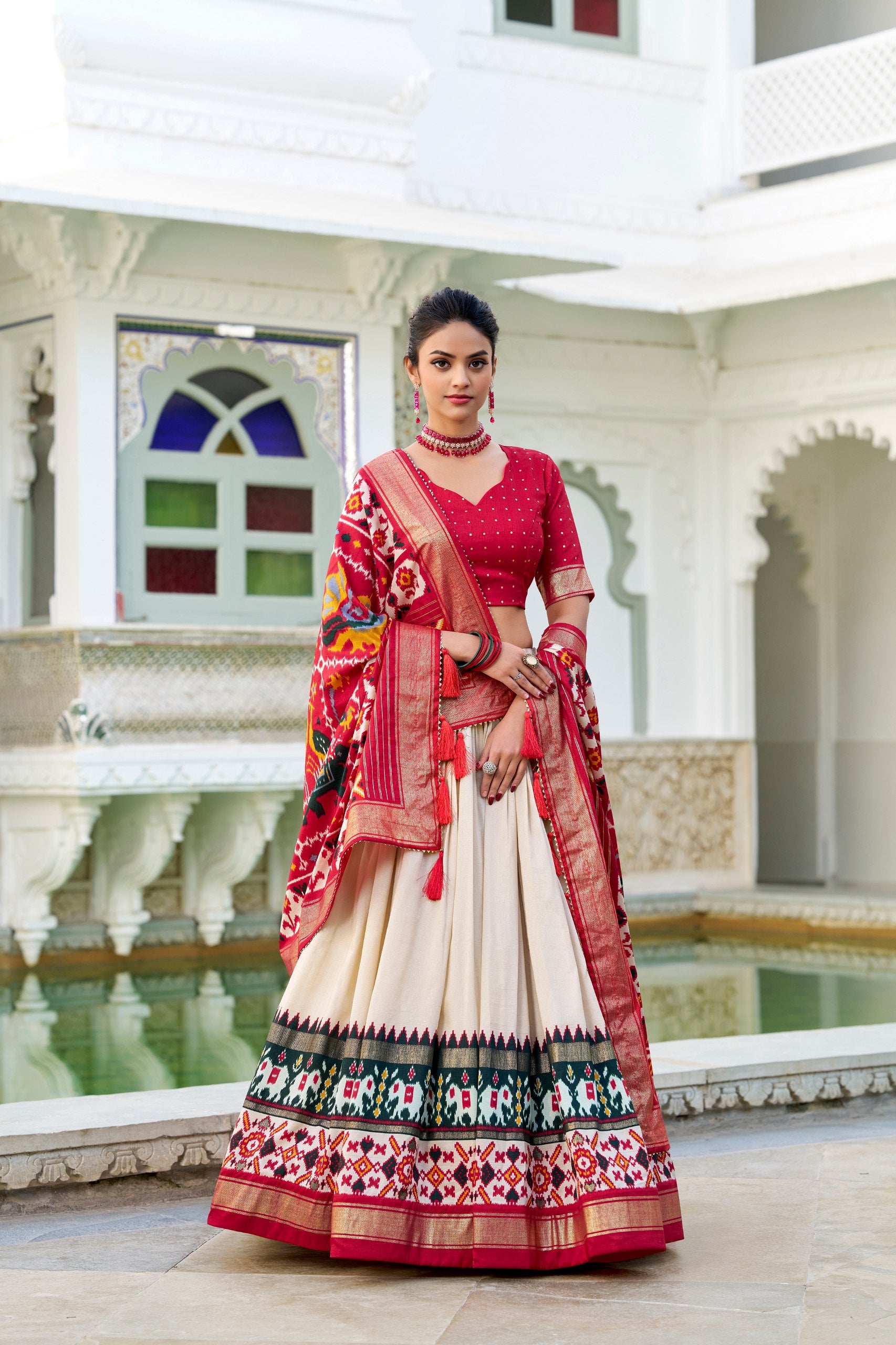 Glamgait Cream Patola Lehenga Choli with Red Banarasi Dupatta
