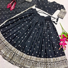 Elegant Black Silk Lehenga Choli with Heavy Gold Embroidered Border & Dupatta