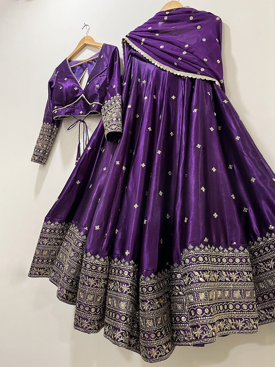 Royal Purple Silk Lehenga Choli with Heavy Gold Embroidered Border & Dupatta