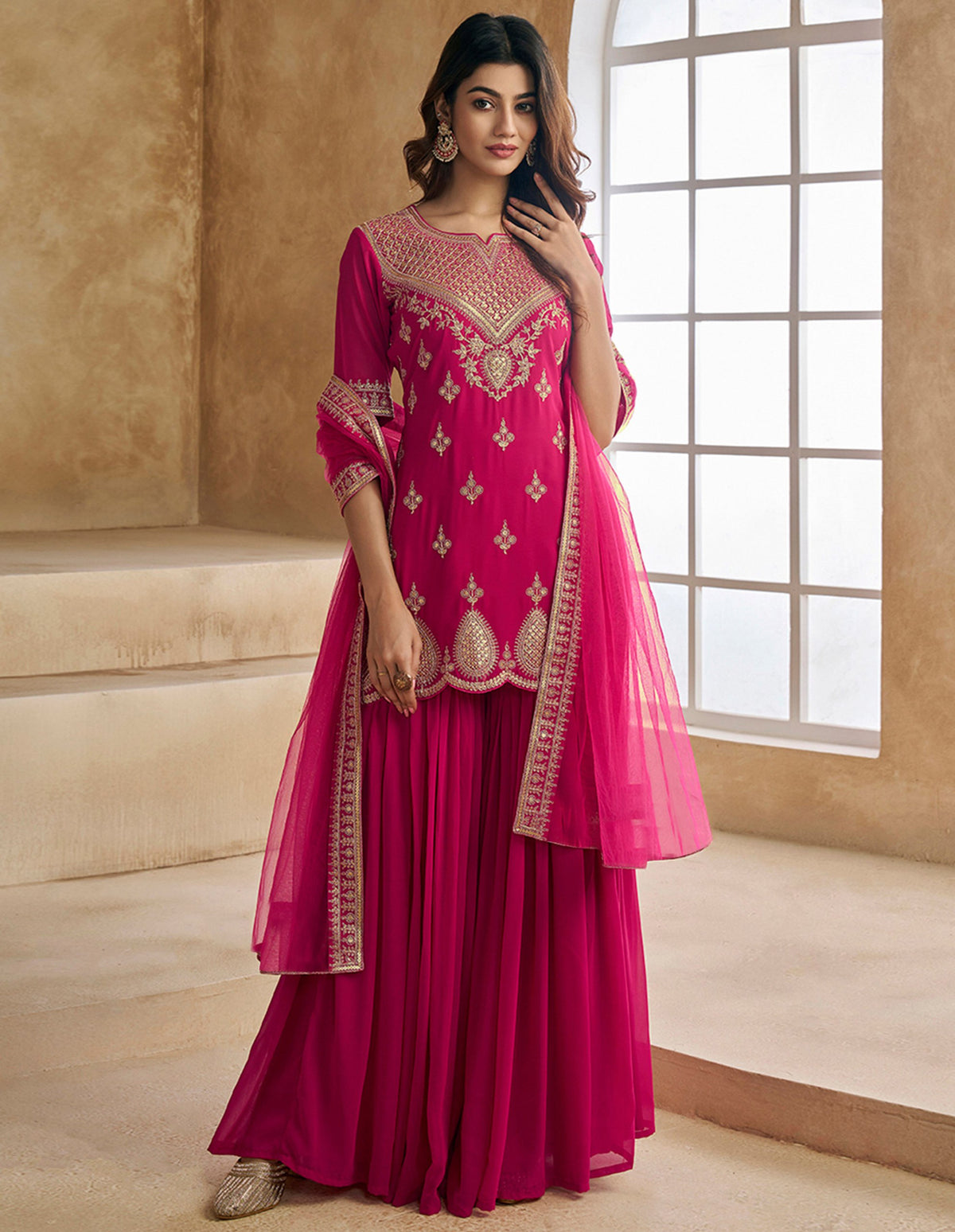 Rani Pink Heavy Embroidered Kurta Sharara Set with Net Dupatta for Women